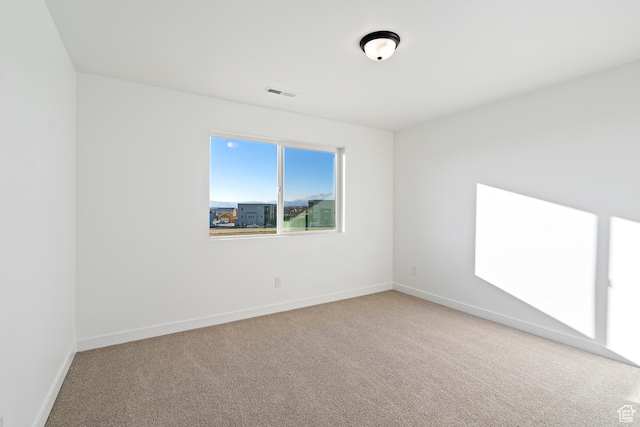6941 W Farnsworth Peak Dr S Unit 316, West Jordan, UT 84081 - carpeted spare room featuring baseboards