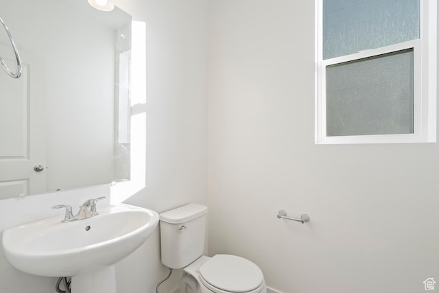 6941 W Farnsworth Peak Dr S Unit 316, West Jordan, UT 84081 - bathroom featuring a sink and toilet