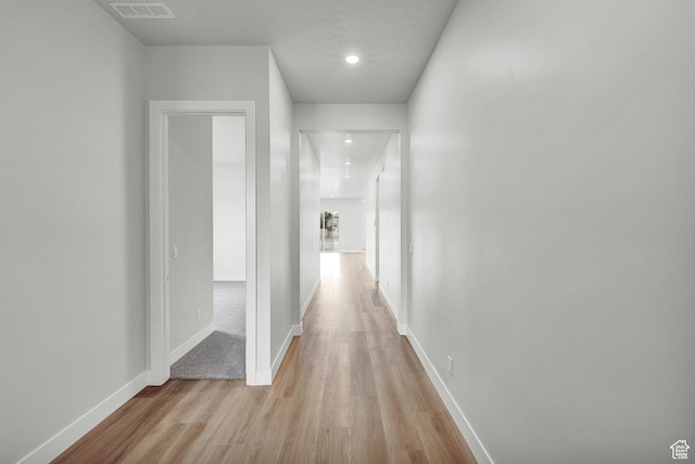 6199 W Wapiti Ridge Ln Unit 333, Herriman, UT 84096 - corridor with light wood-type flooring and recessed lighting