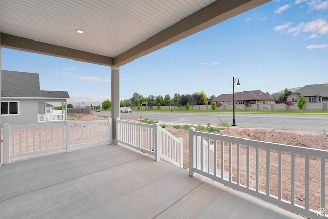 6199 W Wapiti Ridge Ln Unit 333, Herriman, UT 84096 - covered porch featuring a residential view