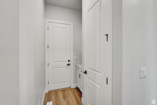 6199 W Wapiti Ridge Ln Unit 333, Herriman, UT 84096 - corridor featuring light wood-type flooring and baseboards