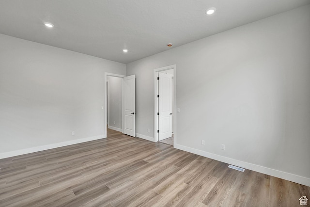 6199 W Wapiti Ridge Ln Unit 333, Herriman, UT 84096 - empty room featuring light wood finished floors and recessed lighting