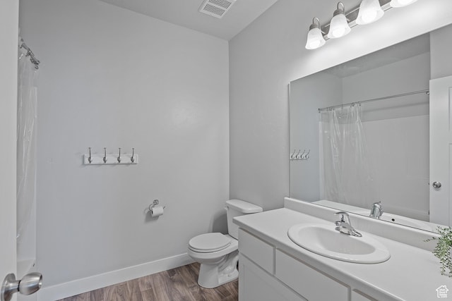 14642 S Mckellen Dr Unit C303, Herriman, UT 84096 - bathroom featuring vanity and wood finished floors