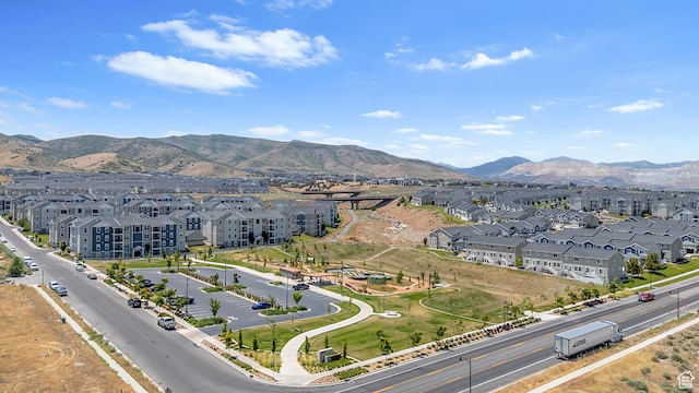 14642 S Mckellen Dr Unit C303, Herriman, UT 84096 - aerial view of residential area with a mountainous background
