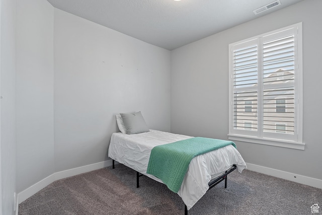 14642 S Mckellen Dr Unit C303, Herriman, UT 84096 - bedroom featuring carpet and baseboards