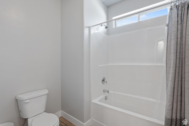 14642 S Mckellen Dr Unit C303, Herriman, UT 84096 - bathroom with shower / bath combo and wood finished floors