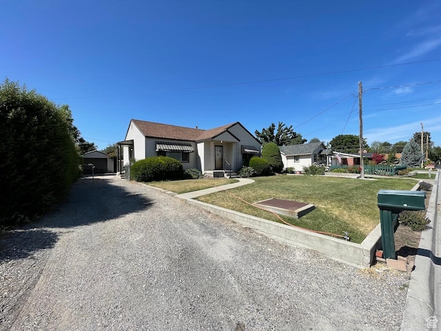115 W Lester Ave, Murray, UT 84107 - single story home with a front yard and driveway