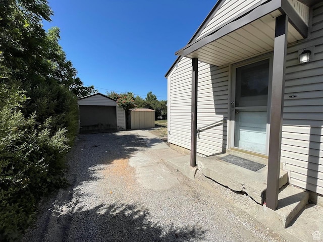 115 W Lester Ave, Murray, UT 84107 - view of patio / terrace featuring a shed