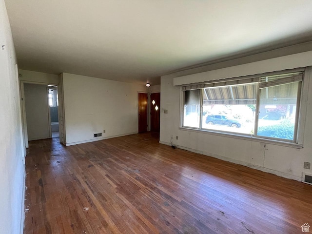 115 W Lester Ave, Murray, UT 84107 - spare room with wood finished floors and baseboards