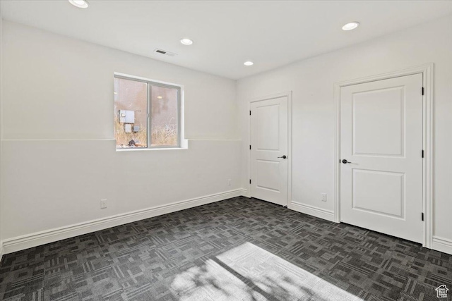 1076 W River Hill Dr, Spanish Fork, UT 84660 - unfurnished bedroom with dark colored carpet and recessed lighting