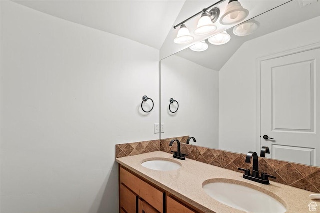 1076 W River Hill Dr, Spanish Fork, UT 84660 - bathroom featuring double vanity and lofted ceiling