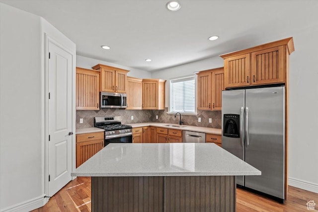 1076 W River Hill Dr, Spanish Fork, UT 84660 - kitchen with stainless steel appliances, backsplash, light wood-style floors, and recessed lighting