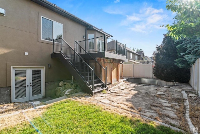 1076 W River Hill Dr, Spanish Fork, UT 84660 - back of house featuring stairway, french doors, stucco siding, and a patio area