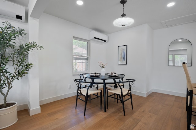 1214 E Parkway Ave, Salt Lake City, UT 84106 - dining area with a wall mounted air conditioner, light wood-style flooring, plenty of natural light, and recessed lighting