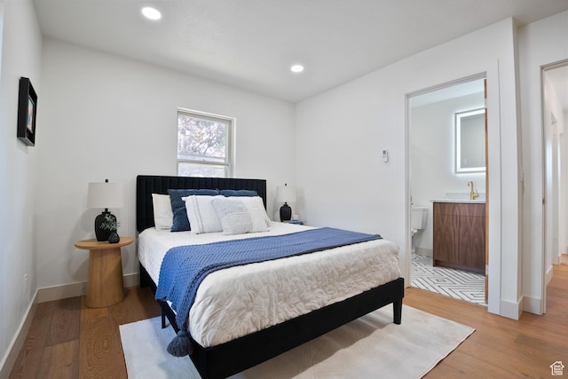 1214 E Parkway Ave, Salt Lake City, UT 84106 - bedroom with light wood-type flooring, recessed lighting, and ensuite bathroom