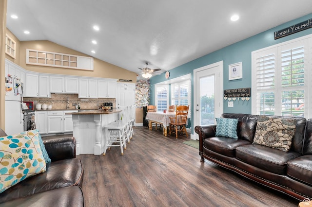 302 W 730 S, Tooele, UT 84074 - living room featuring a ceiling fan, dark wood-style flooring, lofted ceiling, and recessed lighting