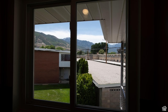2260 E Murray Holladay Rd S Unit 22, Holladay, UT 84117 - doorway to outside featuring a mountain view and plenty of natural light