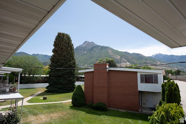 2260 E Murray Holladay Rd S Unit 22, Holladay, UT 84117 - view of grassy yard featuring a mountain view