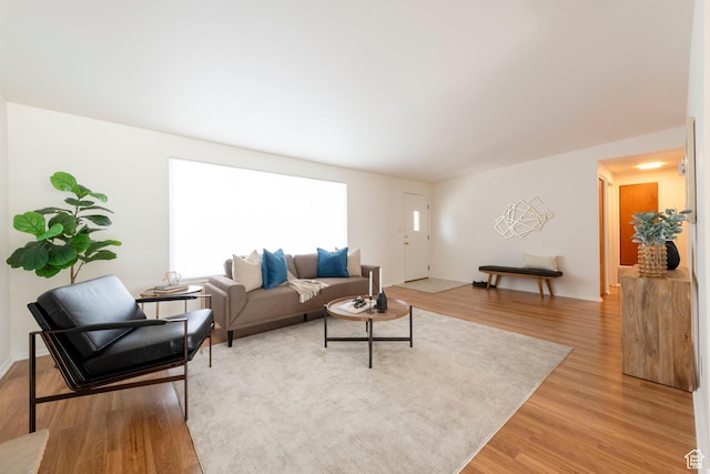 2260 E Murray Holladay Rd S Unit 22, Holladay, UT 84117 - living room with light wood finished floors