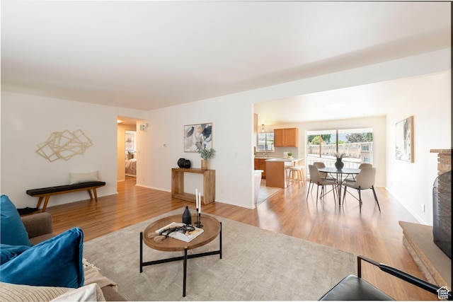 2260 E Murray Holladay Rd S Unit 22, Holladay, UT 84117 - living area featuring light wood finished floors