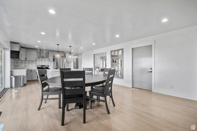 2451 E Cavalier Dr, Cottonwood Heights, UT 84121 - dining room featuring light wood-style flooring and recessed lighting