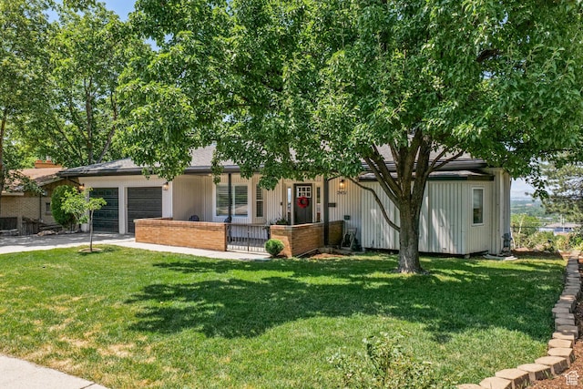 2451 E Cavalier Dr, Cottonwood Heights, UT 84121 - view of front of home with an attached garage and driveway