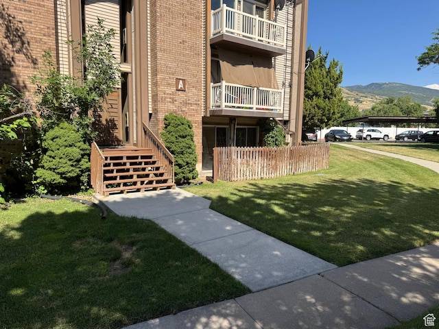 88 W 50 S Unit A4, Centerville, UT 84014 - view of building exterior featuring a mountain view and stairway