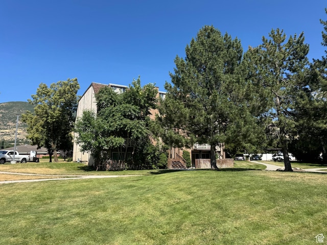 88 W 50 S Unit A4, Centerville, UT 84014 - view of home's community featuring a yard and stairway
