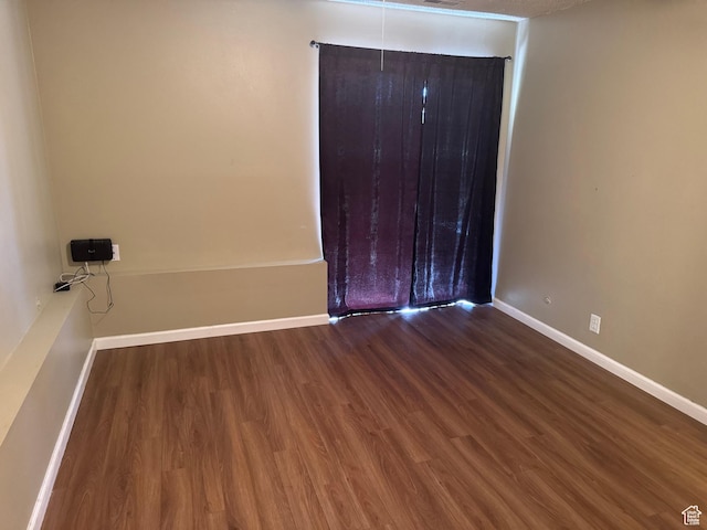 88 W 50 S Unit A4, Centerville, UT 84014 - unfurnished bedroom with wood finished floors and baseboards