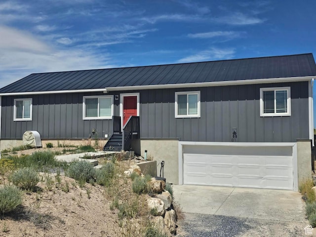 81 S T St, Eureka, UT 84628 - ranch-style home featuring a metal roof, a garage, and driveway