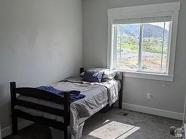 81 S T St, Eureka, UT 84628 - carpeted bedroom with baseboards