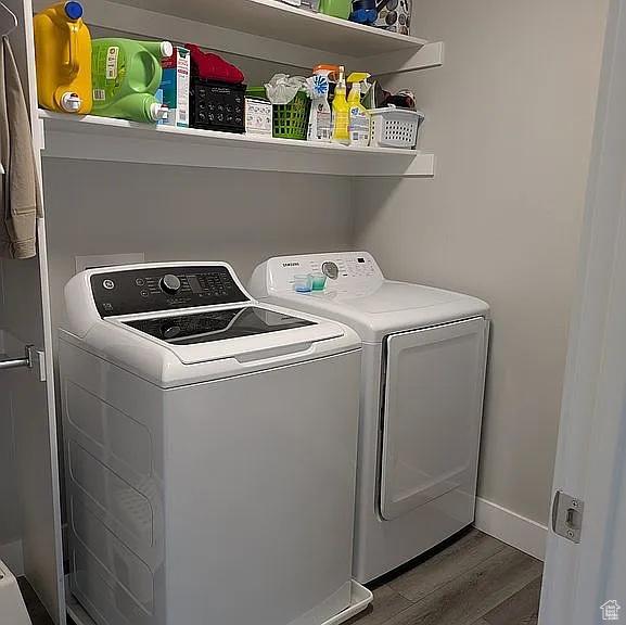 81 S T St, Eureka, UT 84628 - laundry area with washer and clothes dryer and wood finished floors