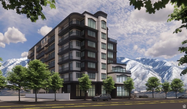 149 E Vine St, Murray, UT 84107 - view of building exterior with a mountain view