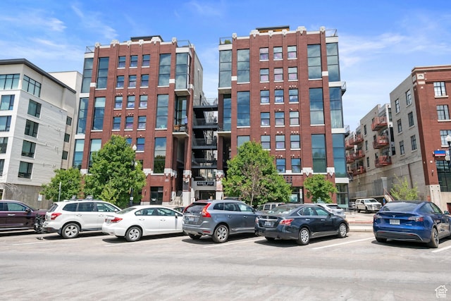 360 W 300 S Unit 233, Salt Lake City, UT 84101 - view of building exterior with uncovered parking