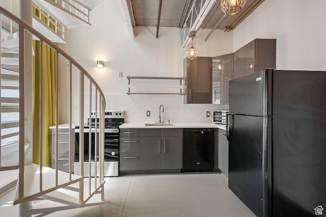 360 W 300 S Unit 233, Salt Lake City, UT 84101 - kitchen with black appliances, gray cabinets, finished concrete floors, open shelves, and light countertops