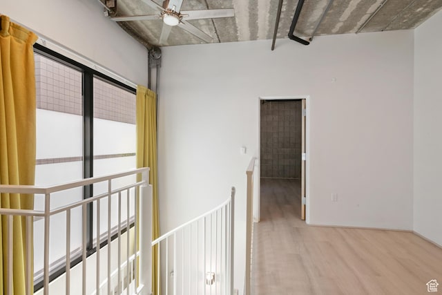 360 W 300 S Unit 233, Salt Lake City, UT 84101 - hall featuring wood finished floors and an upstairs landing