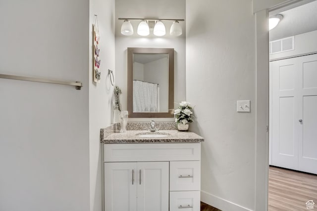 1051 S 500 E Unit E101, Heber City, UT 84032 - full bathroom with vanity and wood finished floors