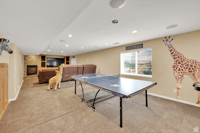 8322 S Copper Vista Cir, West Jordan, UT 84081 - playroom with carpet floors, recessed lighting, and a stone fireplace
