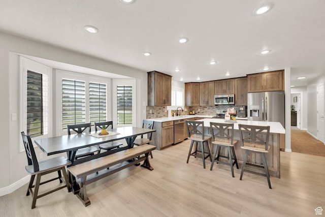 8322 S Copper Vista Cir, West Jordan, UT 84081 - dining room featuring recessed lighting and light wood-type flooring