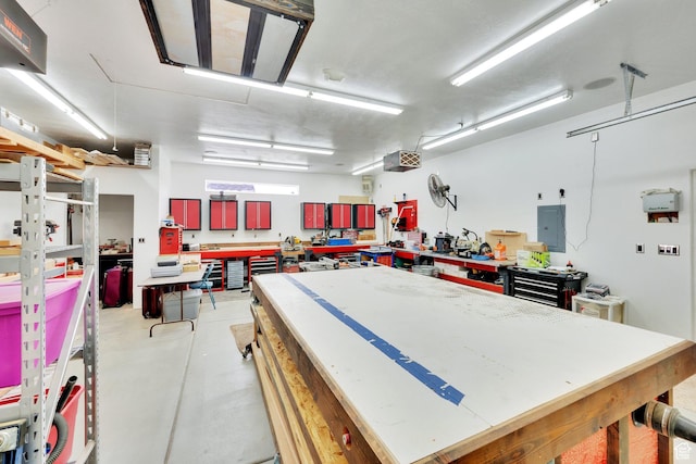 8322 S Copper Vista Cir, West Jordan, UT 84081 - garage with a workshop area and electric panel