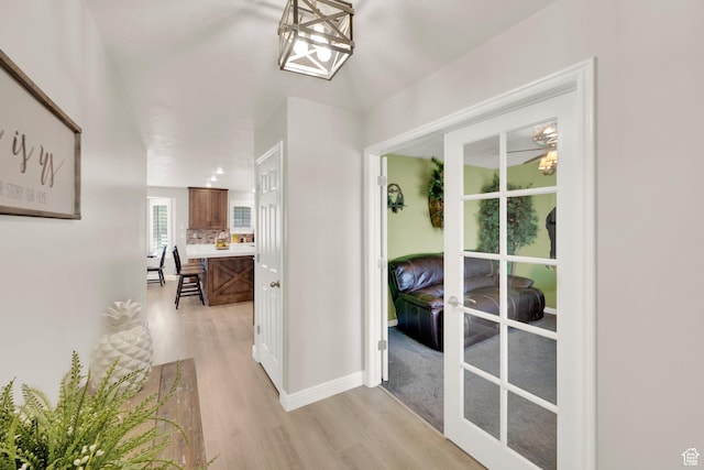 8322 S Copper Vista Cir, West Jordan, UT 84081 - corridor featuring light wood-type flooring