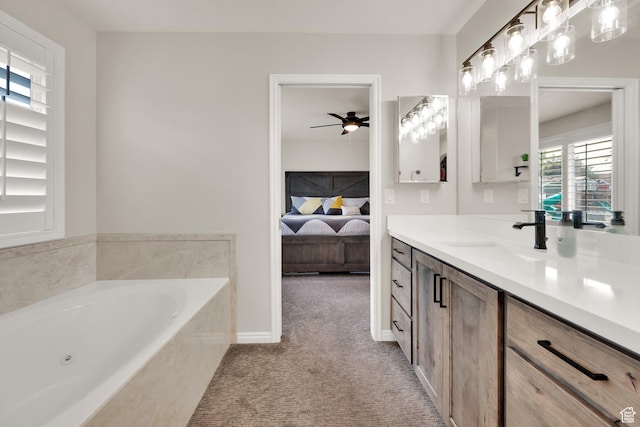 8322 S Copper Vista Cir, West Jordan, UT 84081 - bathroom featuring vanity, a ceiling fan, a tub with jets, and ensuite bathroom