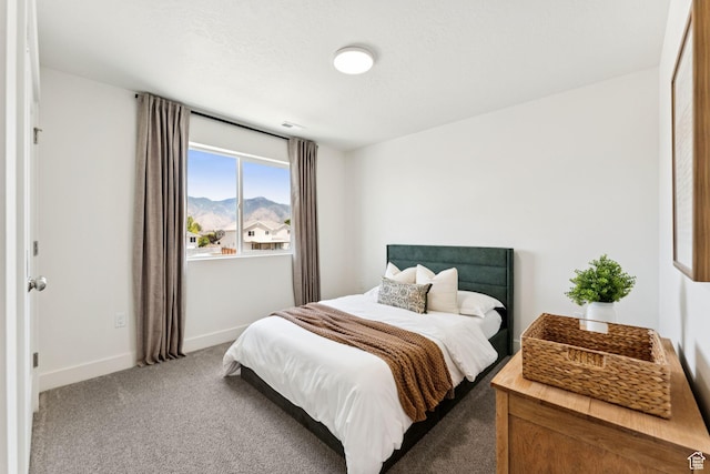 579 E Kings Lndg, Tooele, UT 84074 - carpeted bedroom featuring a mountain view and baseboards