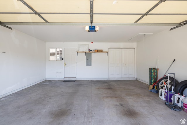 542 W Hale Ave, Moab, UT 84532 - garage featuring a garage door opener and electric panel