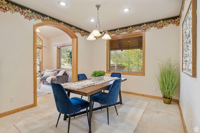 924 Redford Dr, Provo, UT 84604 - dining room featuring arched walkways, light carpet, and recessed lighting