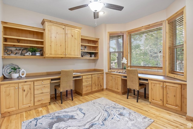 924 Redford Dr, Provo, UT 84604 - office with built in desk, light wood-type flooring, and ceiling fan
