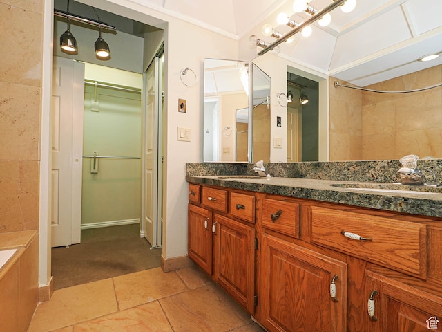 6948 S 855 E, Midvale, UT 84047 - bathroom featuring vanity, a bath, a spacious closet, and a shower