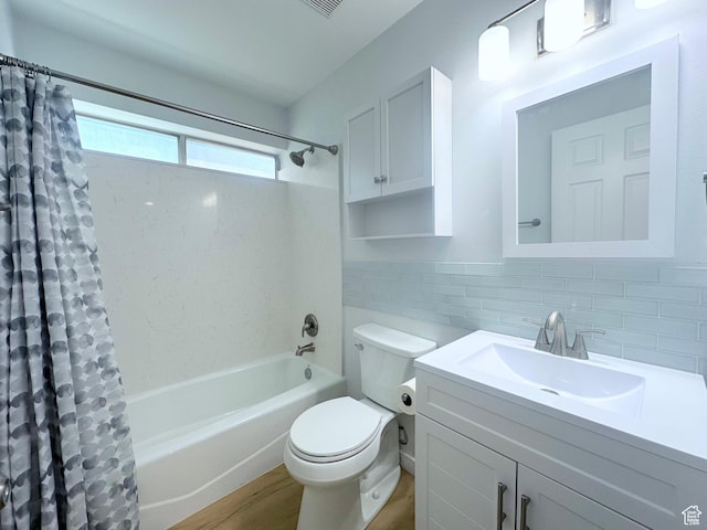 623 S 500 W Unit 17, Provo, UT 84601 - bathroom with shower / tub combo with curtain, vanity, wood finished floors, and backsplash