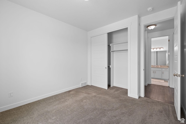 6856 W 8060 S, West Jordan, UT 84081 - unfurnished bedroom featuring carpet flooring and a closet