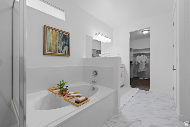 6856 W 8060 S, West Jordan, UT 84081 - full bath featuring marble finish flooring, a garden tub, a walk in closet, and vanity